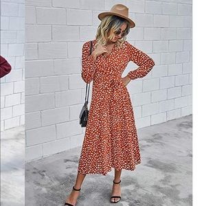 Worn once. Amazon burnt orange and white dots small dress